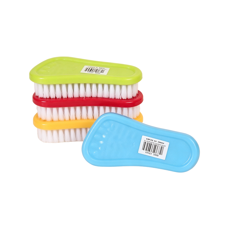 Mini cepillo de viaje para ropa y bolsos